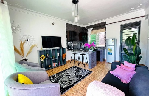 Kireka Apartment | Apartment unit - White House with rental car.