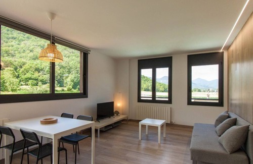 La Vall de Bianya Apartment | Apartment with large terrace and mountain views
