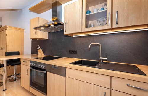 Riezlern Apartment | Apartment with roof terrace, washing machine, cable car included in summer.