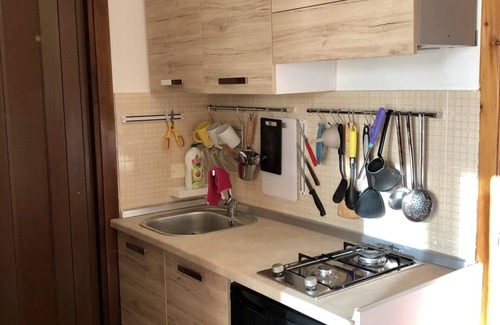 Scalea Apartment | Apartments with a tennis court and a barbecue