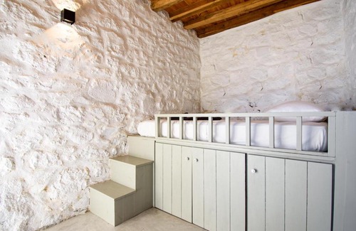 Nisyros Apartment | Apostrophe Traditional Residence in Nisyros with arcurated interior. Privacy & Authenticity