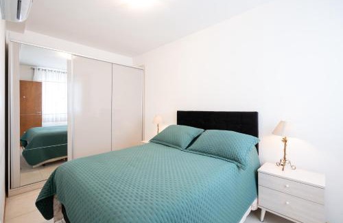 Barra Velha Apartment | Apto em Barra Velha 340m da PRAIA com SACADA com CHURRASQUEIRA, AR CONDICIONADO WI-FI, PISCINA, PORTARIA 24h, ACADEMIA MINI MERCADO e vaga de GARAGEM