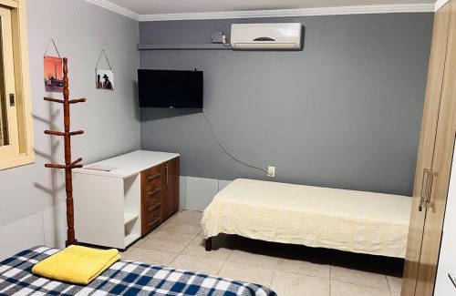 Nonoai House | Apzito Tri com garagem