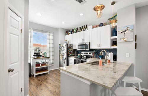 Corpus Christi Condo | ArcadeFun! Walk2Beach! Hot tub! Heated Pool! Sleeps7! Pets!