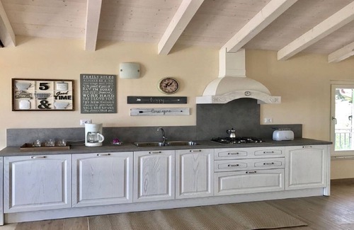 Ponti sul Mincio Apartment | Attic lake view immersed in the Morenic hills