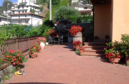 Montano Antilia Apartment | Attic with flowers.