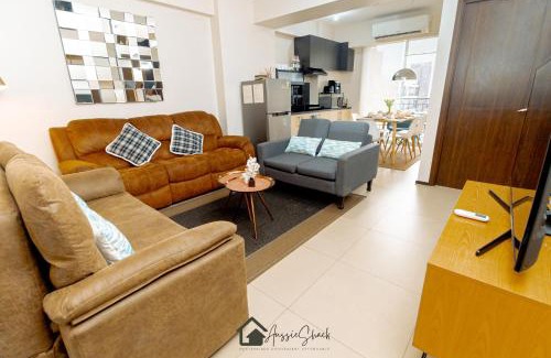 Bagumbayan Apartment | Aussie Shack - 2BR Modern Condo with Skyline View