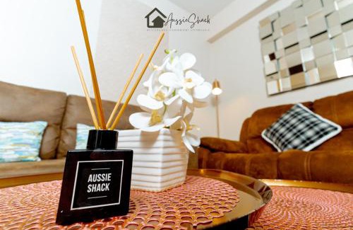 Bagumbayan Apartment | Aussie Shack - 2BR Modern Condo with Skyline View