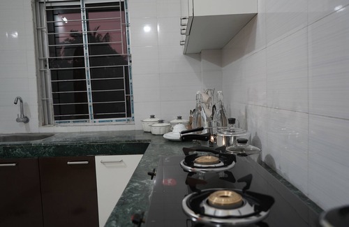 Sualkuchi Apartment | Azure Escape: Stylish 2-Bedroom Retreat in Guwahati with WiFi & AC Comforts
