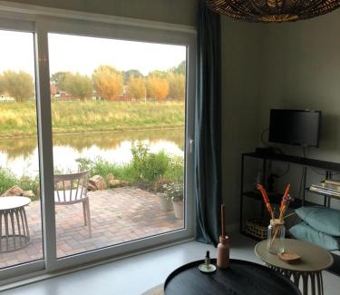 Stiens Ski Chalet | B&B Snurk Stiens, fijn verblijf aan open vaarwater