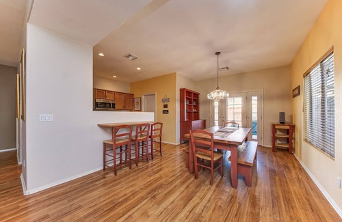 San Tan Valley House | Backyard oasis with private solar heated pool, hot tub and tons of amenities!