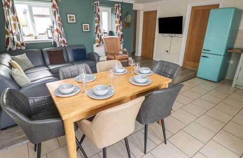 Llanybri Cottage | BARN COTTAGE, pet friendly, with hot tub in Laugharne