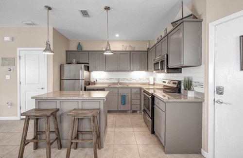Port Isabel House | Bayfront Home ~close to beach~ Community pool~ hot tub ~ family friendly.