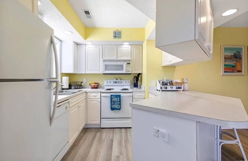 Cherry Grove Beach Condo | Beach Bliss Within Reach: Bright & Serene First-Floor Haven