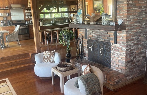 Alligator Point House | BEACH FRONT to BAY with boatdock, swimming pool, pickleball courts and kayaks.