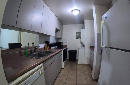 Guanajibo Apartment | Beachfront Apartment in Joyuda With Pool and Basketball Court