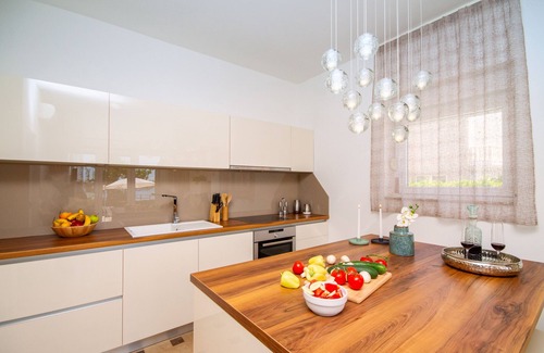 Podstrana Villa | Beachfront Bliss: Villa Amor - A Luxurious 7 bedroom villa with a heated pool