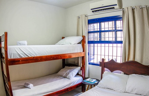 Praia da Enseada Cabin | Beachside Coziness: Your Ideal Escape.