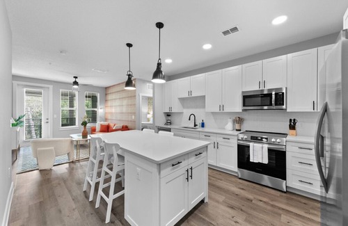 Deerwood Apartment | Beachy Bliss: Elegant 2BR/2BA with Pool & Gym