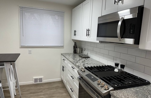 Mentor House | Beaming Mentor Bungalow with great central location and large fenced in yard