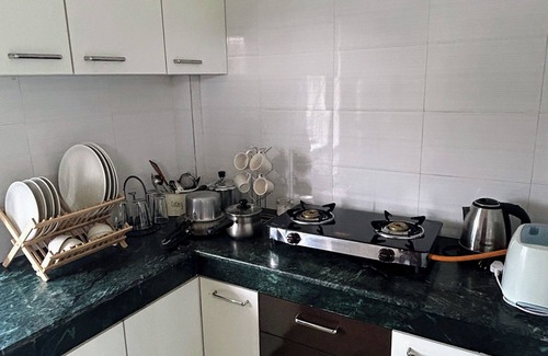 Sualkuchi Apartment | BeauMonde boutique suites - Azure Escape with AC and Wifi.