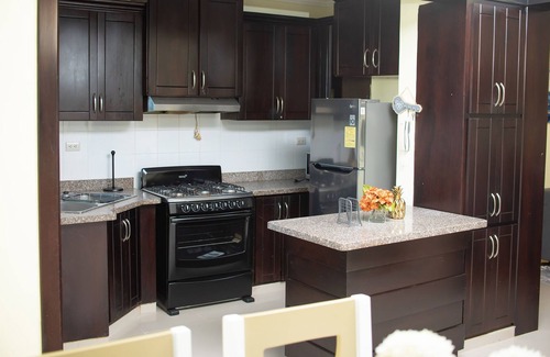 San Francisco de Macoris Condo | Beautiful 1st Floor, 3 bedroom Condo! Salida a Santo Domingo! SFM private patio!