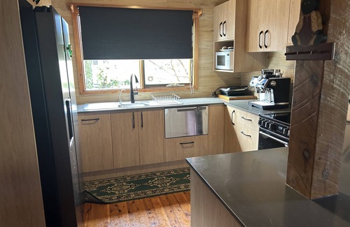 Burrill Lake Cottage | Beautiful 3 Bedroom Waterfront Log Cabin with own Jetty at Fabulous Burrill Lake