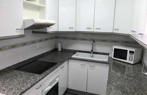 Calafell Apartment | Beautiful 3 bedroom apartment with pool and sea views 50m from the beach