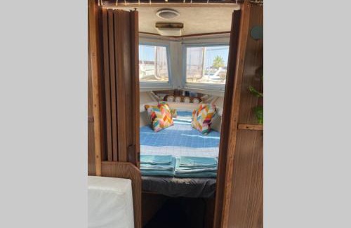 Sant Adria de Besos Boat Rental | Beautiful 70s vintage yacht boat in Barcelona