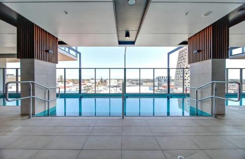 Adelaide Central Business District Apartment | Beautiful Cambodian Inspired Apartment with Pool & Gym
