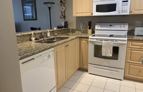 Fort Myers Condo | Beautiful condo located directly on the River with pool side & lake views
