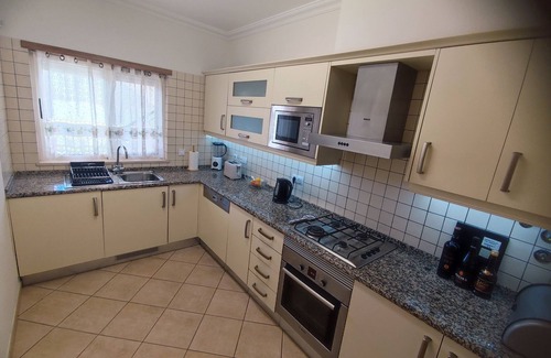 Guia Apartment | Beautiful designer ground floor apartment with leisure complex pool, gym & sauna