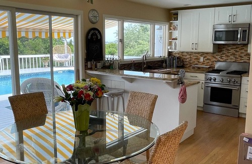 Westhampton House | Beautiful, dog-friendly 4BR home on 1.6 acres. Waterfront view and private dock.