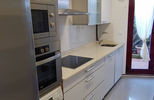 Santander Apartment | Beautiful ground floor with garden, pool and close to the beach, idela families