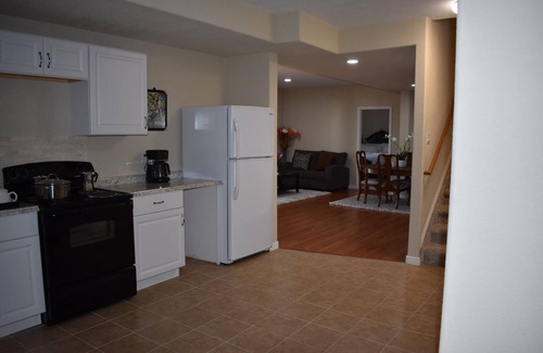 Aurora Apartment | Beautiful, new and spacious walk out basement