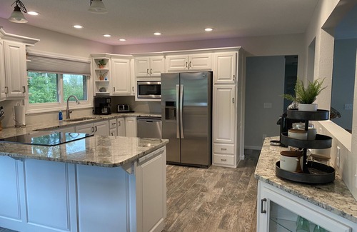 Grand Rapids House | .Beautiful, spacious lake home with level elevation to sandy beach.