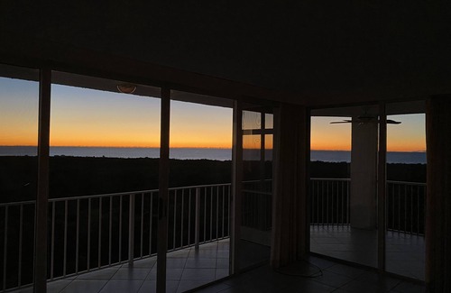Pelican Bay Condo | Beautiful sunset views of the Gulf from this western facing 9th floor condo.