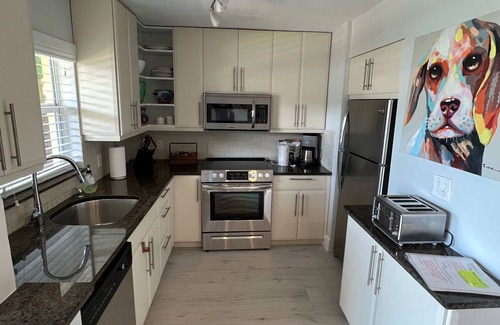 Harbor Village Condo | Beautiful Waterfront Condo. Walk to the beach, shops, restaurants & more!