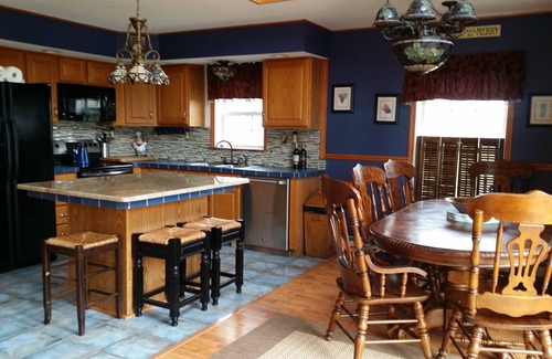 North Lake George Ski Chalet | Beautiful Waterfront Lake George Log Chalet with Dock