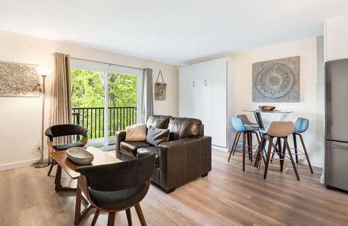 Orchard District Condo | Beautifully Remodeled top floor condo with two balconies, a fireplace and BBQ!