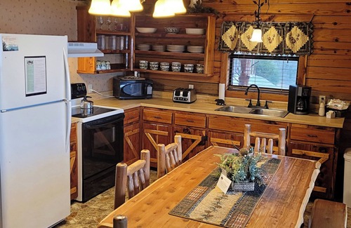 Sylvan Shores Cabin | Beaver Lake Cabin with Boat Dock/Swim Deck/Boat Slips, Incredible Lake View!