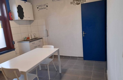 Nimy House | Bedroom 2 With TV, Wifi and Fridge