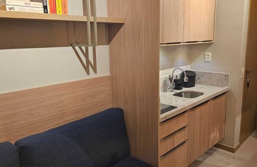 Ondina Apartment | Bedroom and living room in Ondina, Salvador, Bahia, decorated