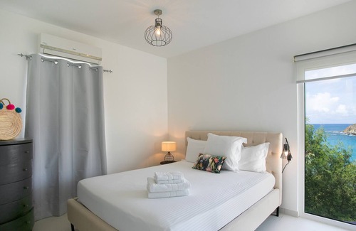 Indigo Bay Apartment | BlackPalm Apt1 (2 bedrooms, terrace, deck & garden sea view)