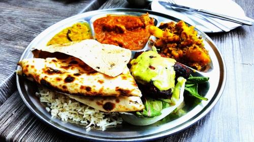 Shivaji Nagar Hotel | Blue Bliss Hotels By PPH Living Infantry Road