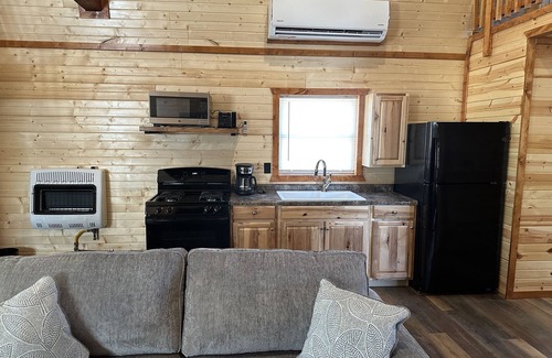 Johnson County Cabin | Blue Cabin in the woods close to Whiteman AF Base and Univ. of Central Missouri