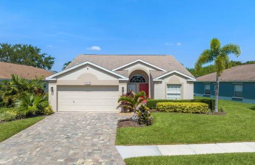 Sabal Harbour House | Blue Heron House! Cozy home with heated pool and pool toys! Water view out back!