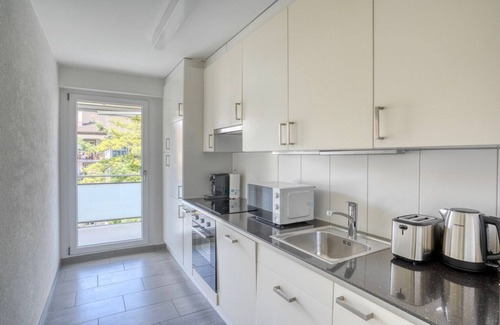 St. Johann Apartment | Blueground | St Johann, Storage room, 5 min to train