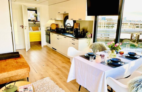 Heiligenhafen Boat Rental | Boat 'Hausboot Inkl Motorboot, Ostsee' with Sea View, Private Terrace and Wi-Fi