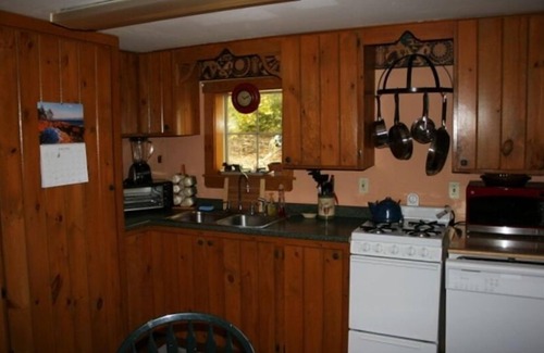 Farmington Falls Cottage | Booking for 2025. Lakefront, private, dog-friendly, canoe, 2 kayaks, pedal boat.